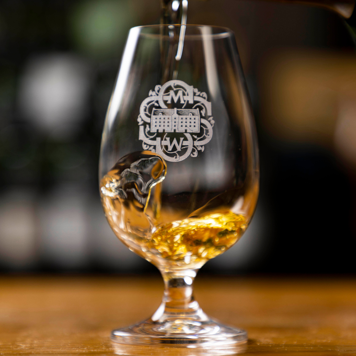 SMWS Whisky pouring into a glass scotch single malt single cask
